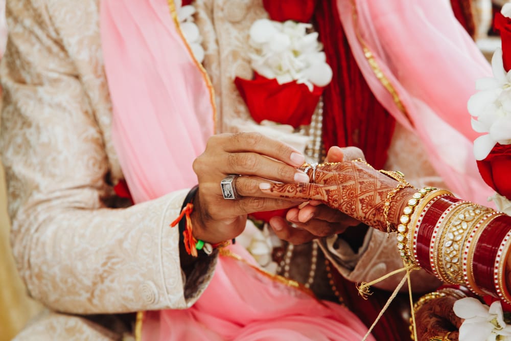 A young Indian boy and girl, who were arranged to be married, are doing their Indian wedding rituals