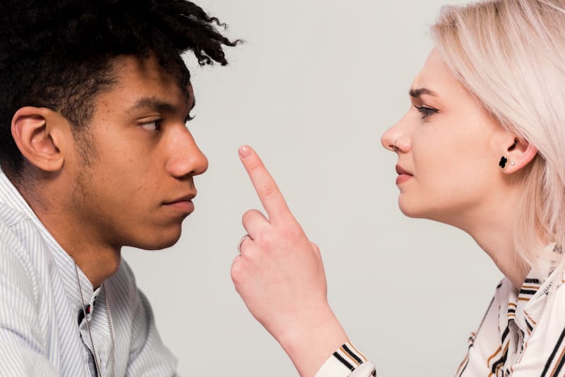 A young couple are unhappy after discussing each others political views