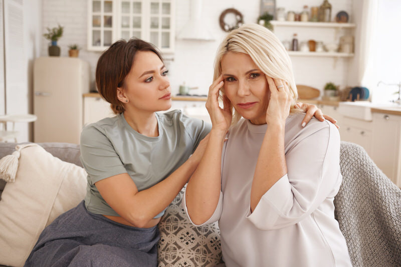 A daughter is trying to comfort her mom after having a heated discussion about moms relationship with her son-in-law