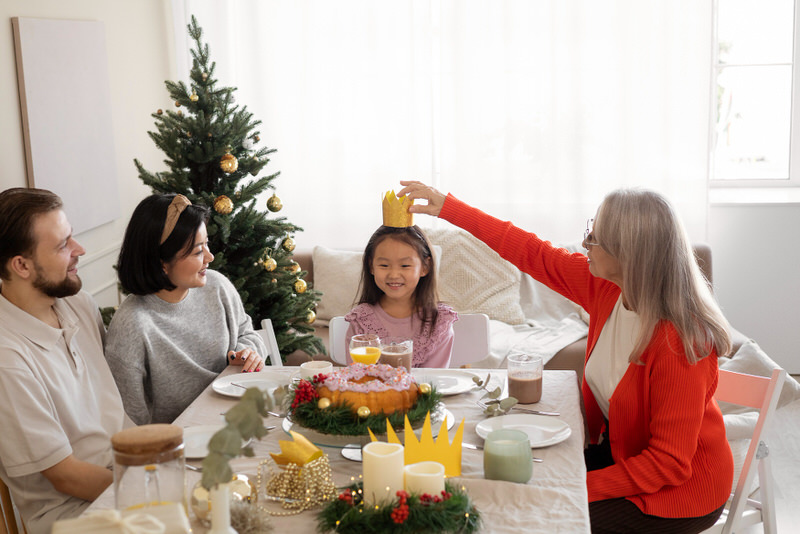 A young family is bonding at breakfast during their Christmas festivities